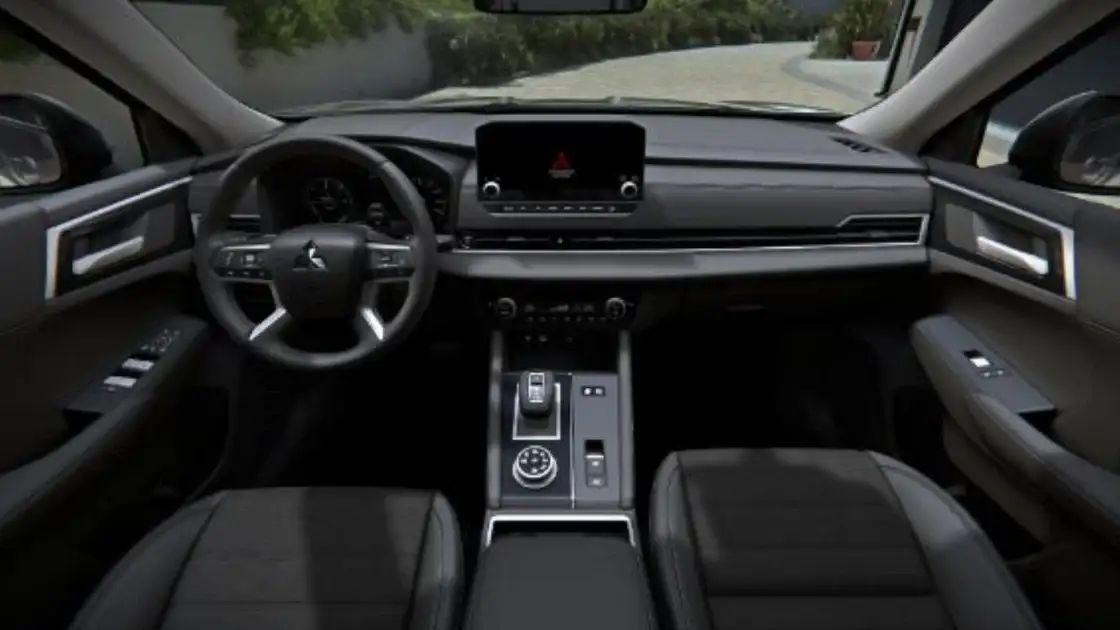 2026 Mitsubishi Outlander interior cockpit with touchscreen infotainment, digital controls, center console, and modern dashboard layout