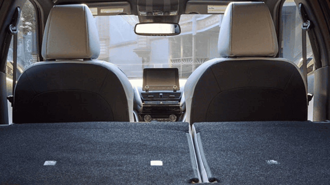 2026 Mitsubishi Eclipse Cross cargo area with rear seats folded flat for added storage space
