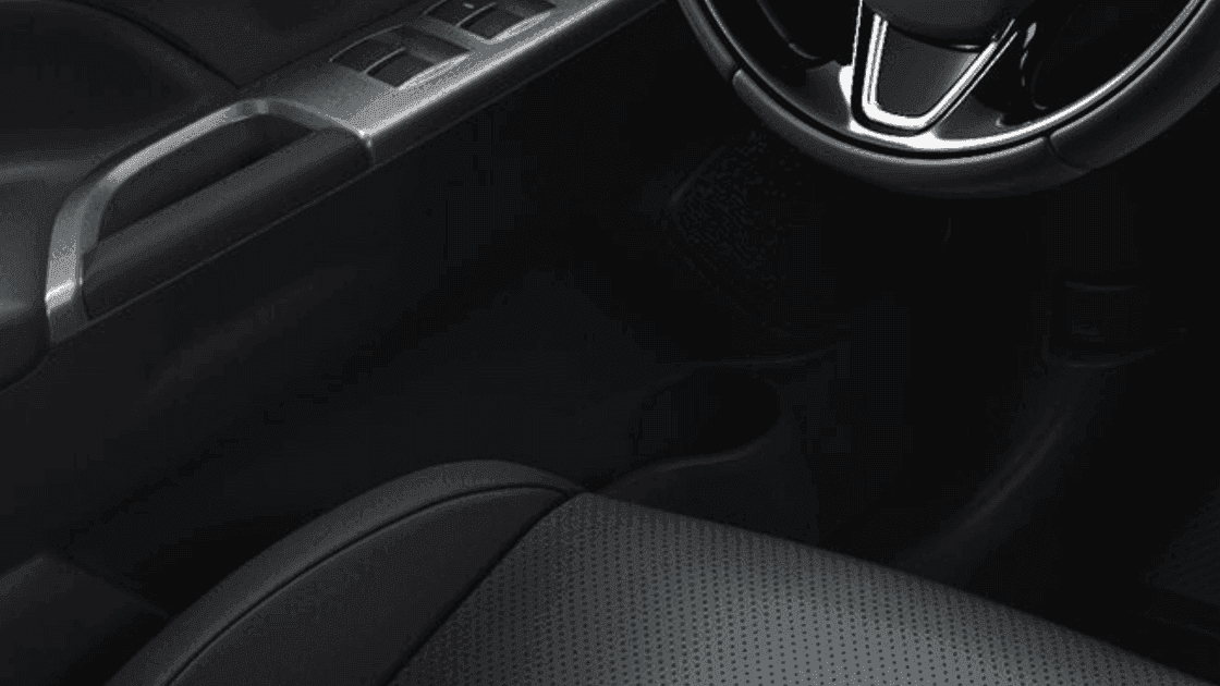 2026 Mitsubishi Outlander Sport front seats with black upholstery and center armrest