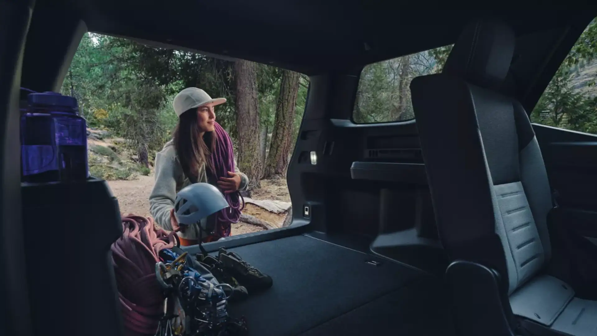 2025 Toyota 4Runner interior cargo area with fold-flat rear seating, highlighting spacious storage and adventure-ready design.