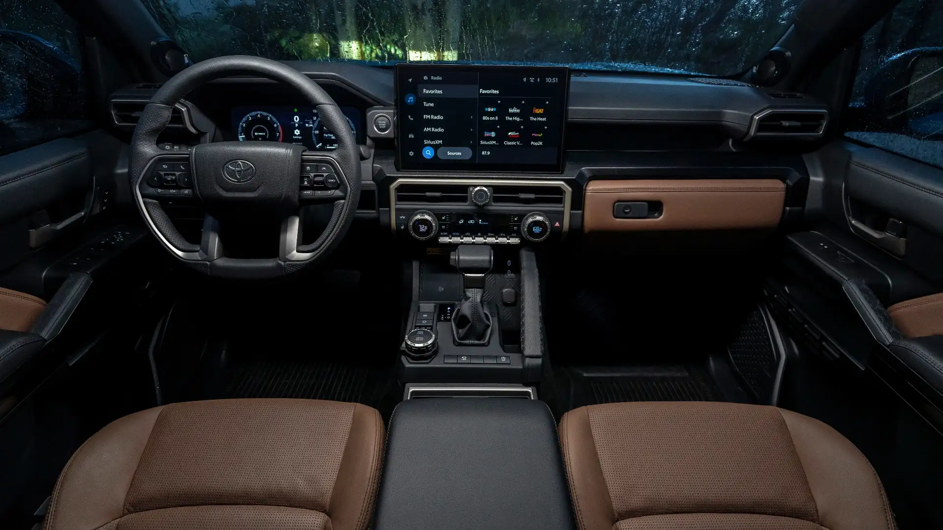 2025 Toyota 4Runner interior features and technology showing the cargo area with fold down rear seats, storage compartments, and premium SUV interior design.