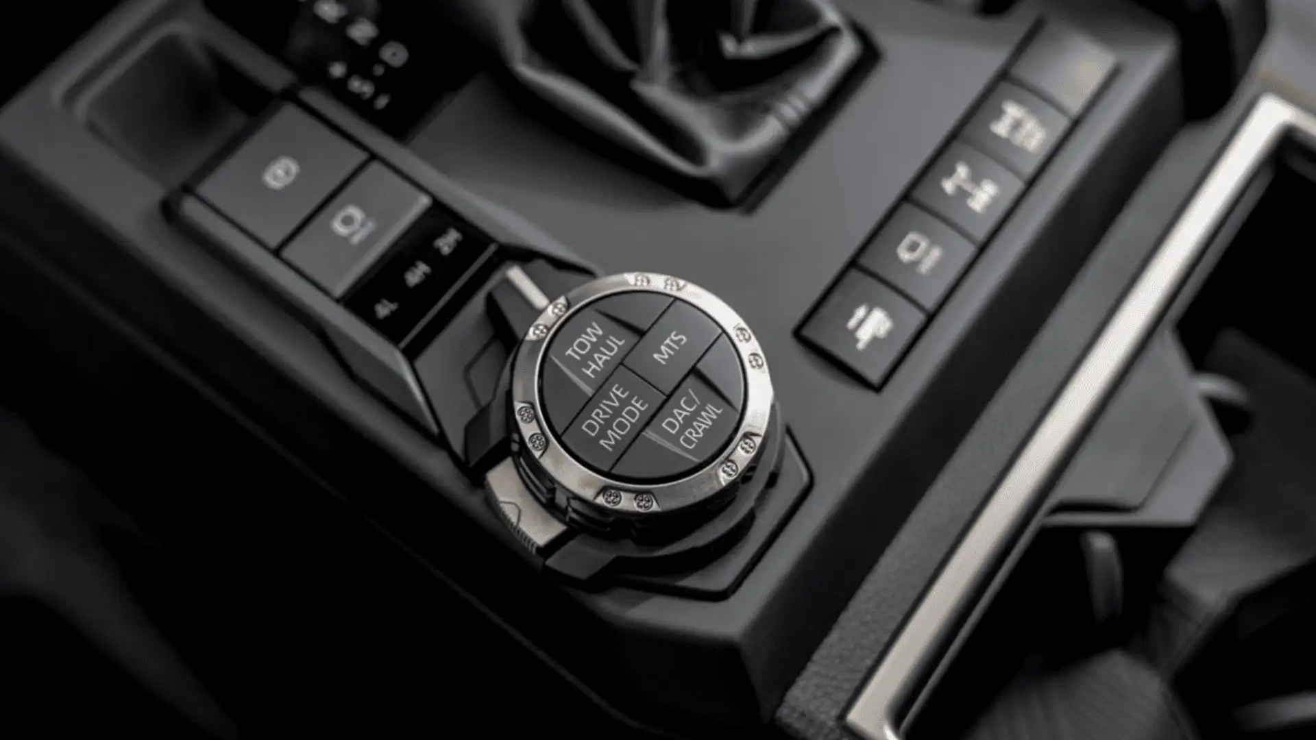 Dashboard and steering wheel view of the 2025 Toyota 4Runner i-FORCE MAX displaying driver assistance technology and safety system controls.