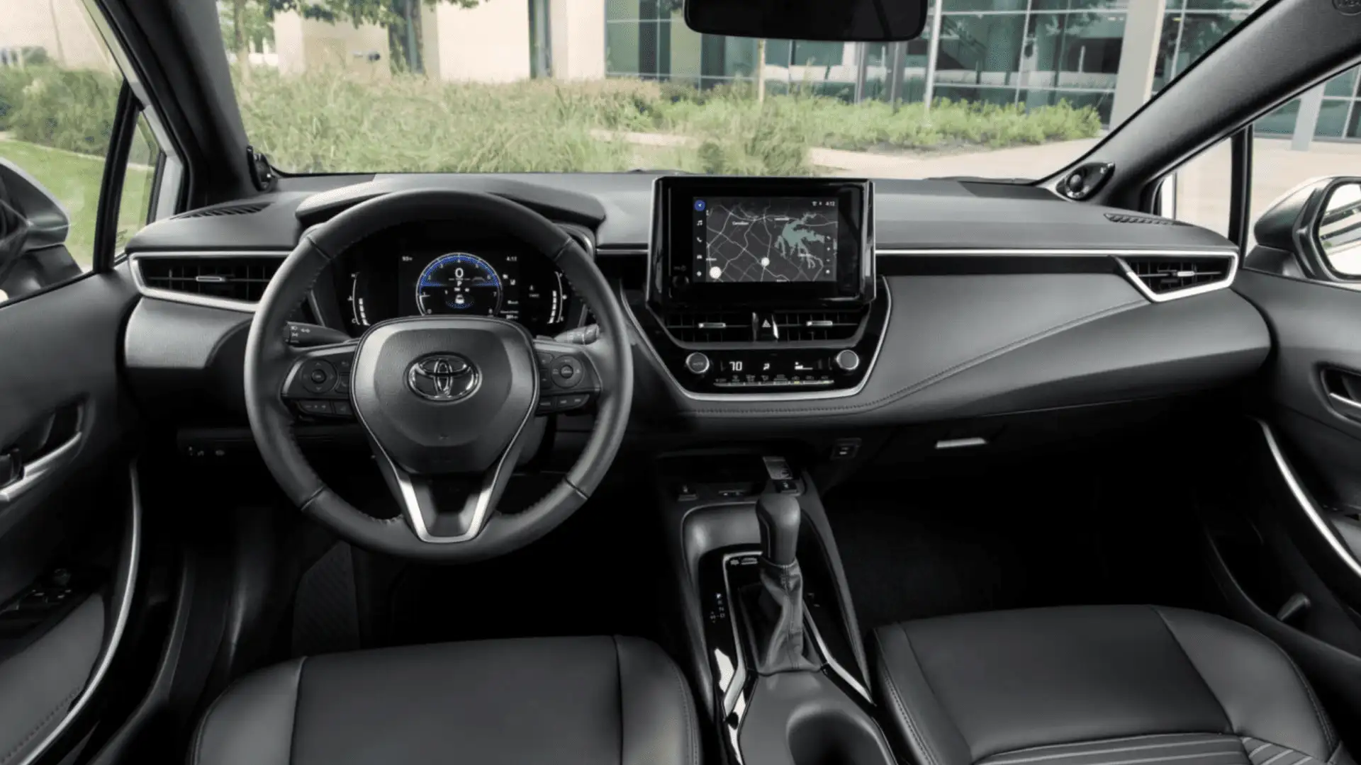 Close-up of the 2025 Toyota Corolla center console featuring smooth automatic gear selector and intuitive drivetrain controls.