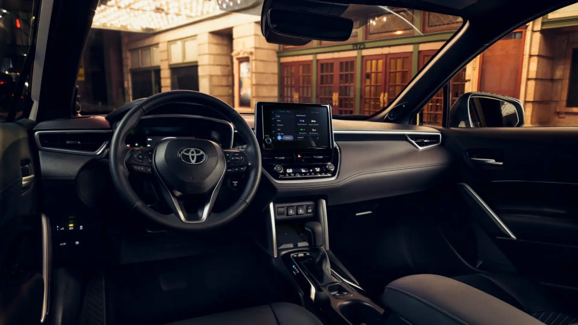 2025 Toyota Corolla Cross Hybrid interior dashboard featuring digital instrument cluster and center touchscreen display