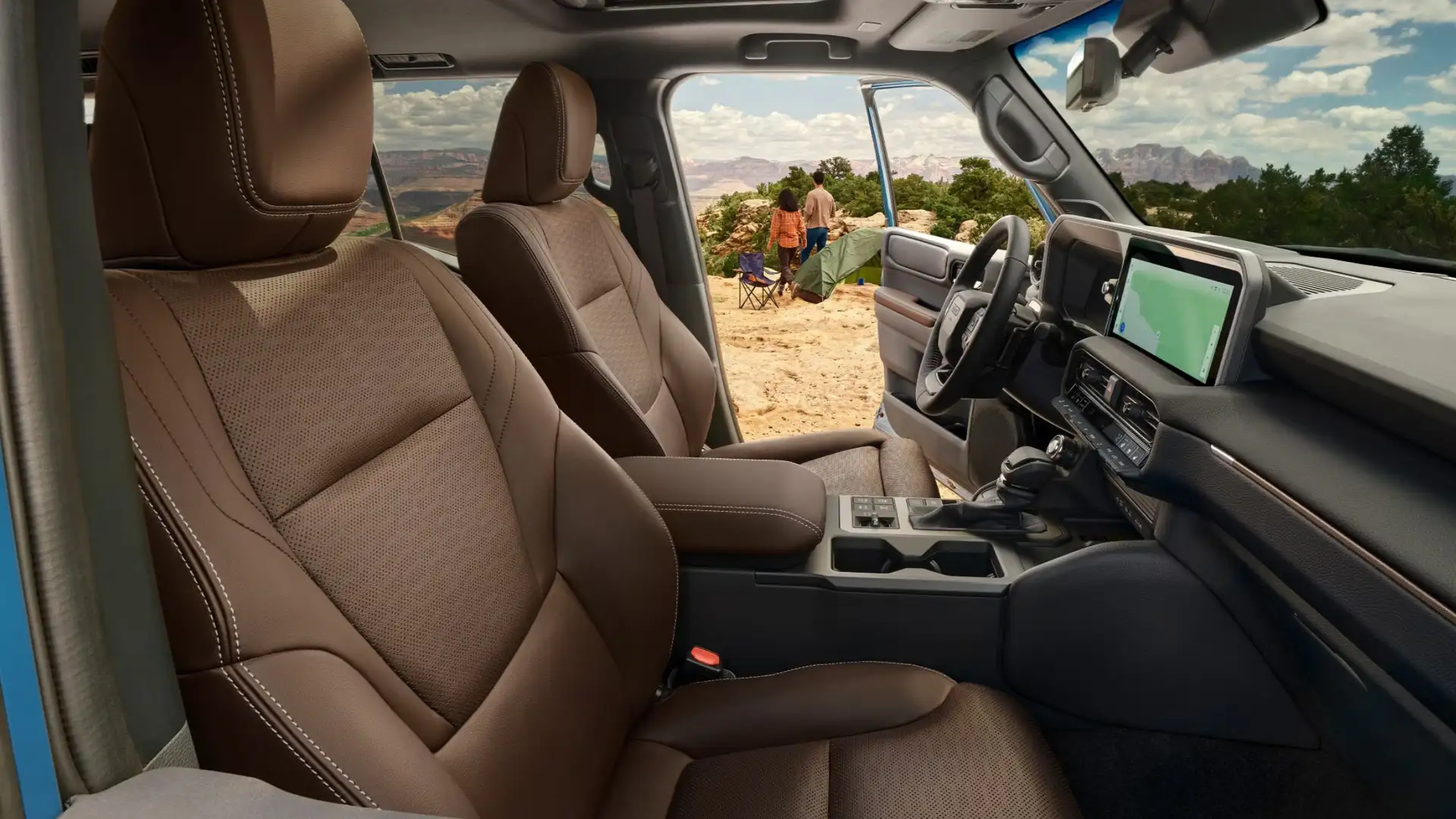 Interior view of the 2025 Toyota Land Cruiser featuring premium seating, touchscreen display, and driver-focused dashboard layout.
