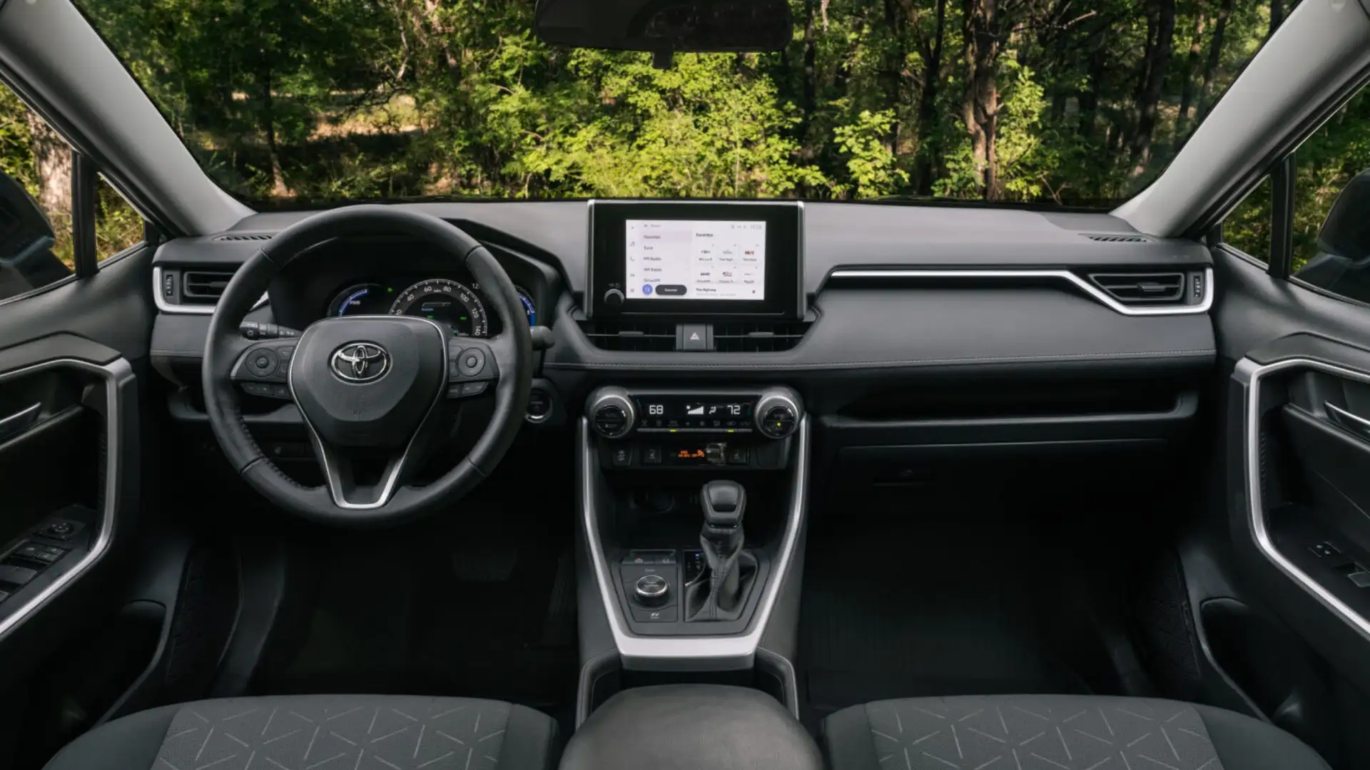 2025 Toyota RAV4 Hybrid infotainment system with touchscreen display, navigation interface, and advanced audio controls