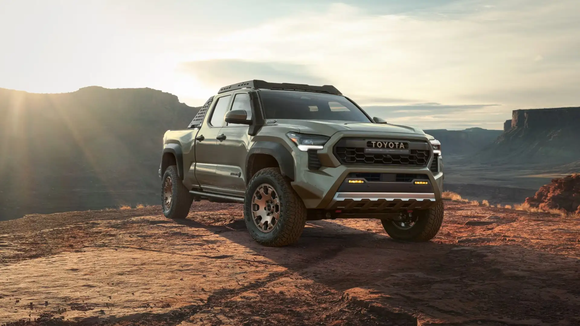 2025 Toyota Tacoma parked on rocky desert terrain, showcasing rugged exterior design and off-road capability near Greencastle, PA.