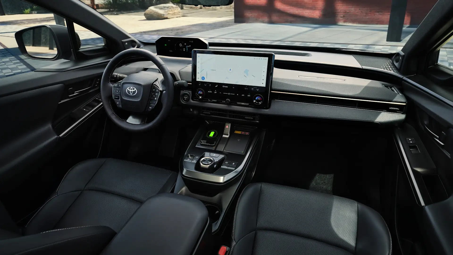 2026 Toyota bZ interior featuring spacious electric vehicle cabin, modern dashboard design, digital displays, and open seating layout.