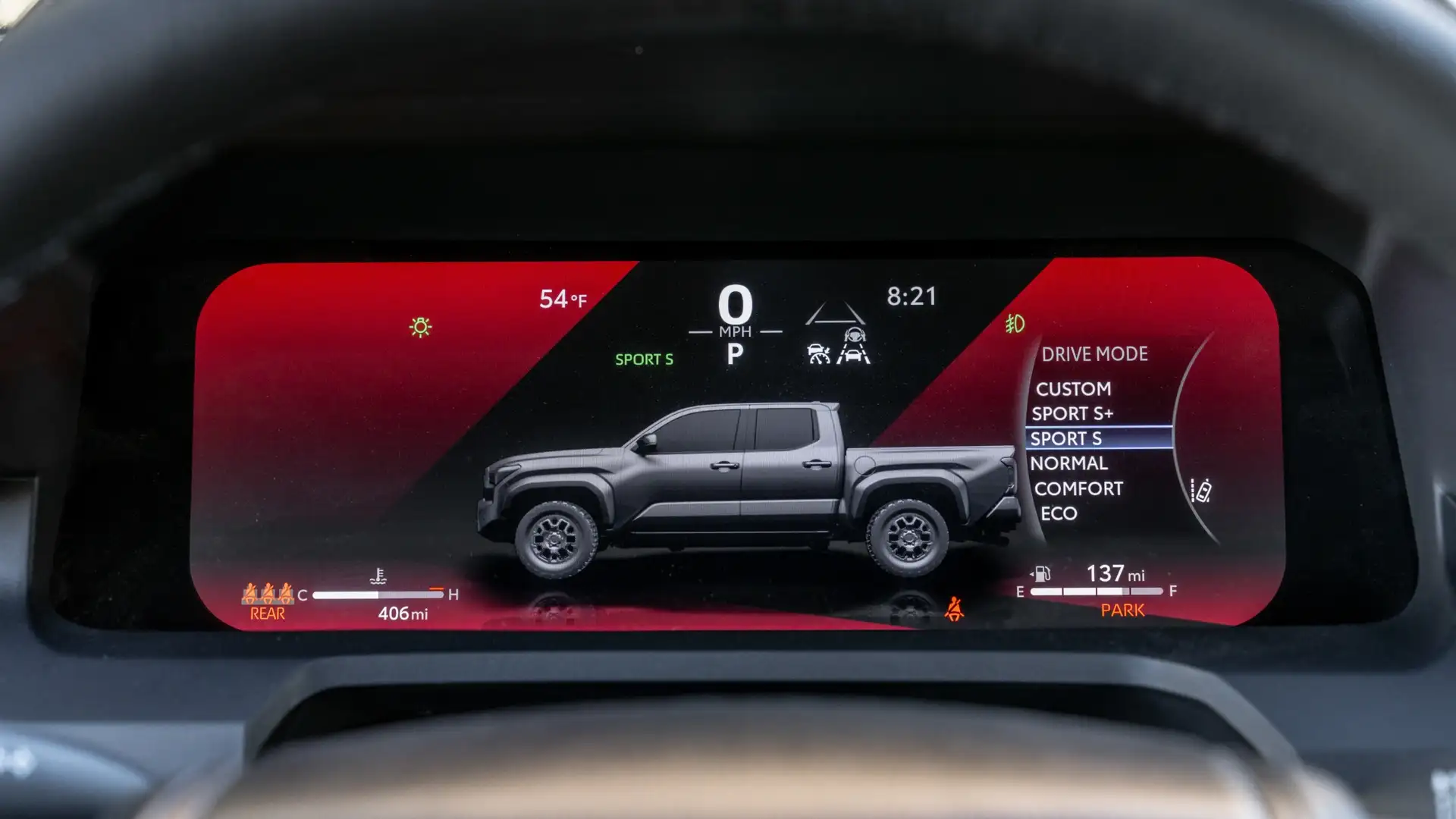 2026 Toyota Tacoma interior dashboard with infotainment screen, connectivity features, and power management controls