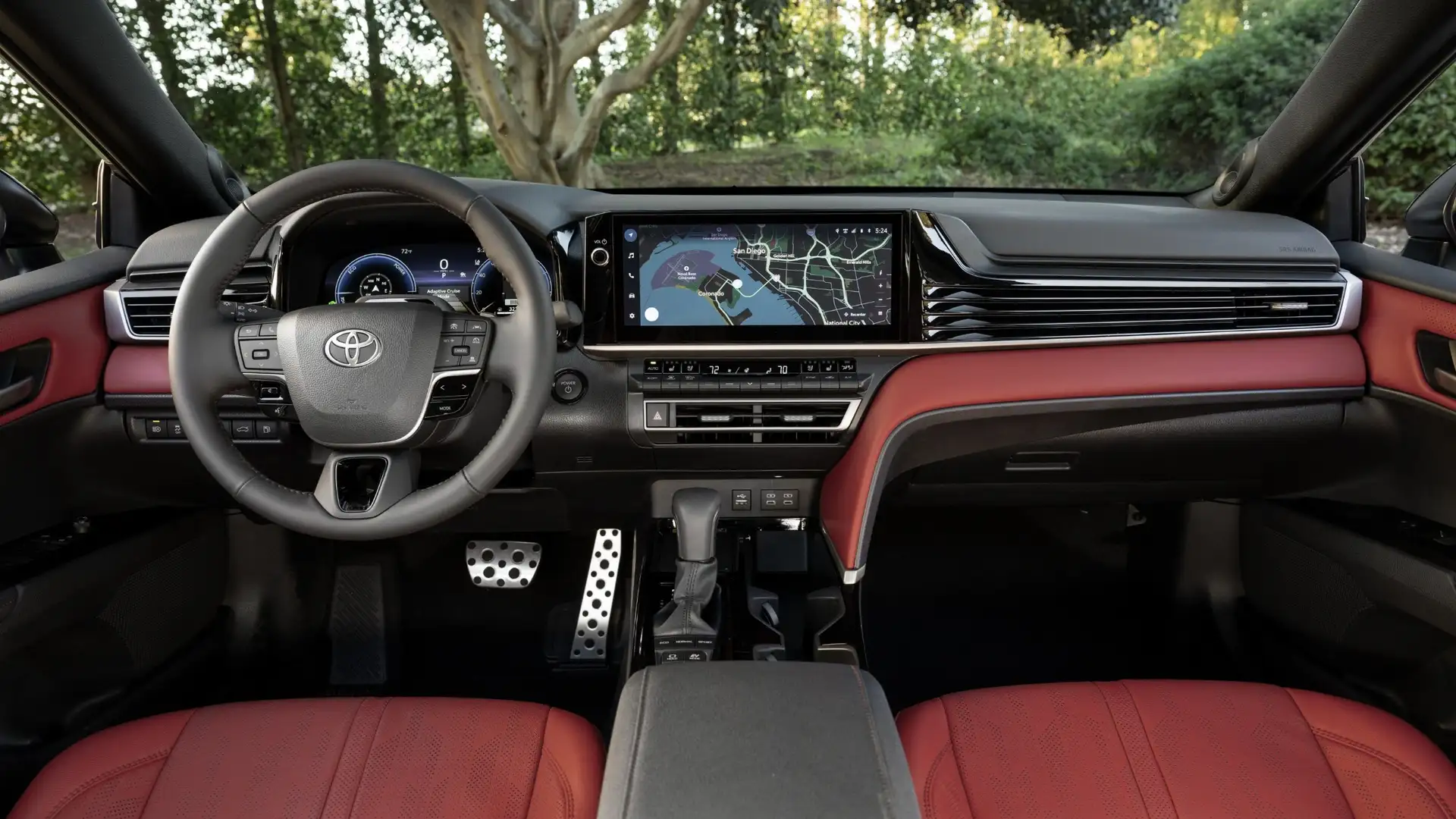 2026 Toyota Camry interior with touchscreen navigation display and red leather seats in Hagerstown, MD.