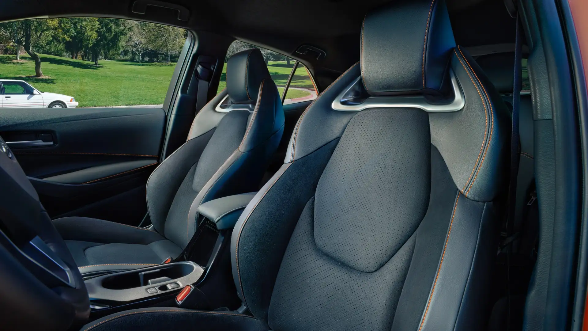2026 Toyota Corolla Hatchback black sport seats with orange stitching and silver headrest trim in Hagerstown, MD.