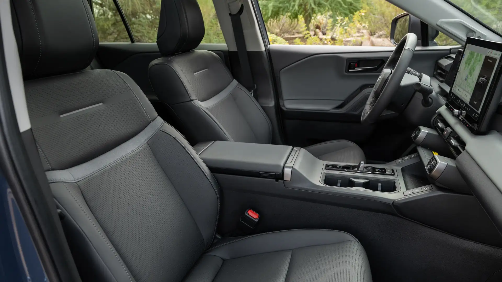 2026 Toyota RAV4 front seats with center console and touchscreen