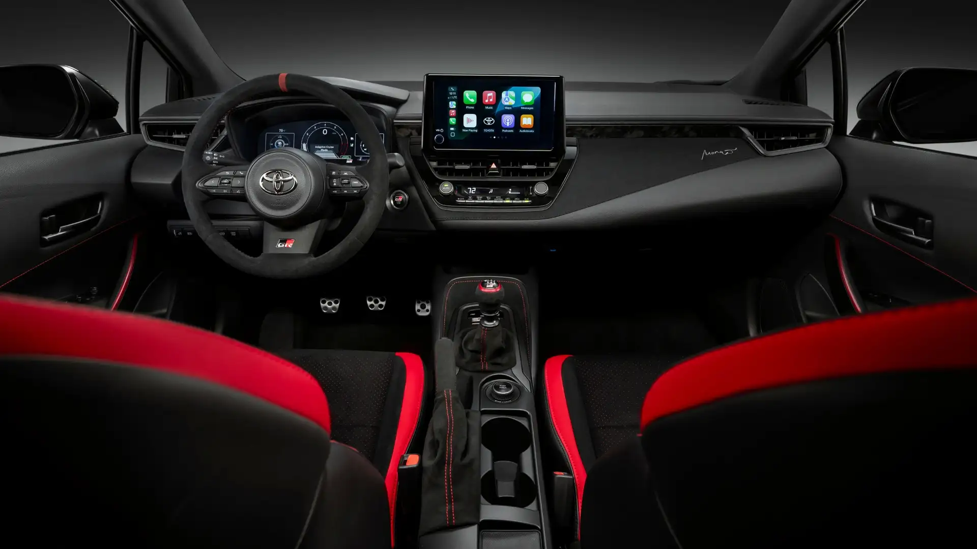 2026 Toyota GR Corolla black red interior Apple CarPlay touchscreen dashboard