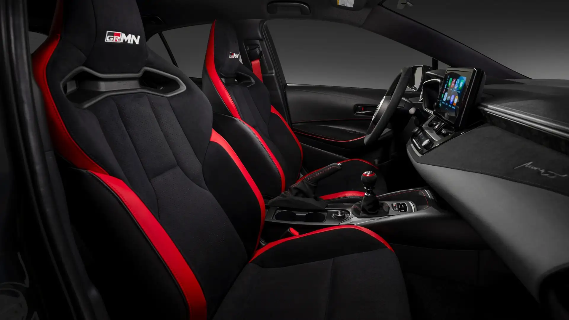 2026 Toyota GR Corolla GRMN black red sport bucket seats manual shifter interior