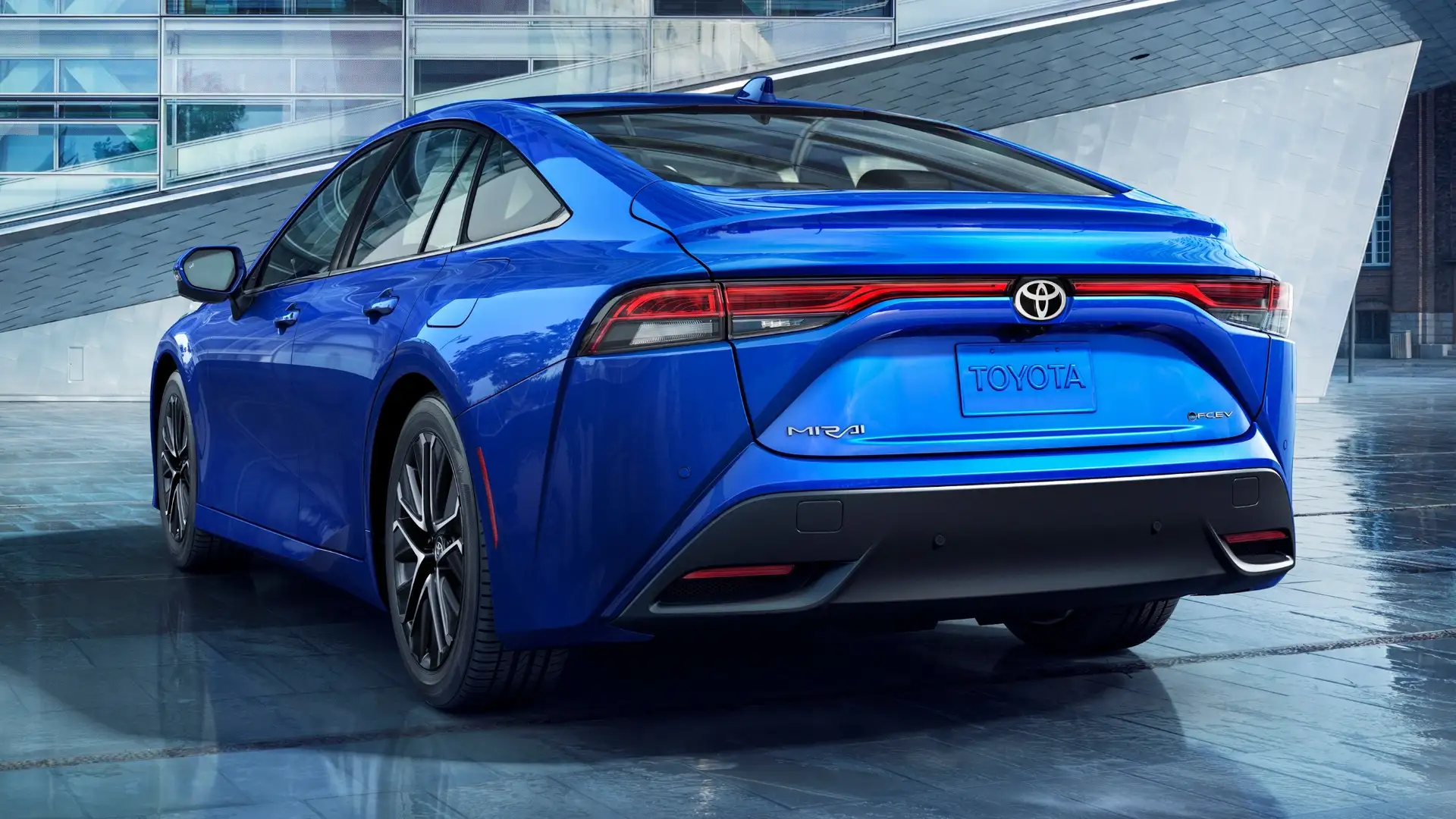 2026 Toyota Mirai blue hydrogen sedan rear exterior view near Hagerstown MD