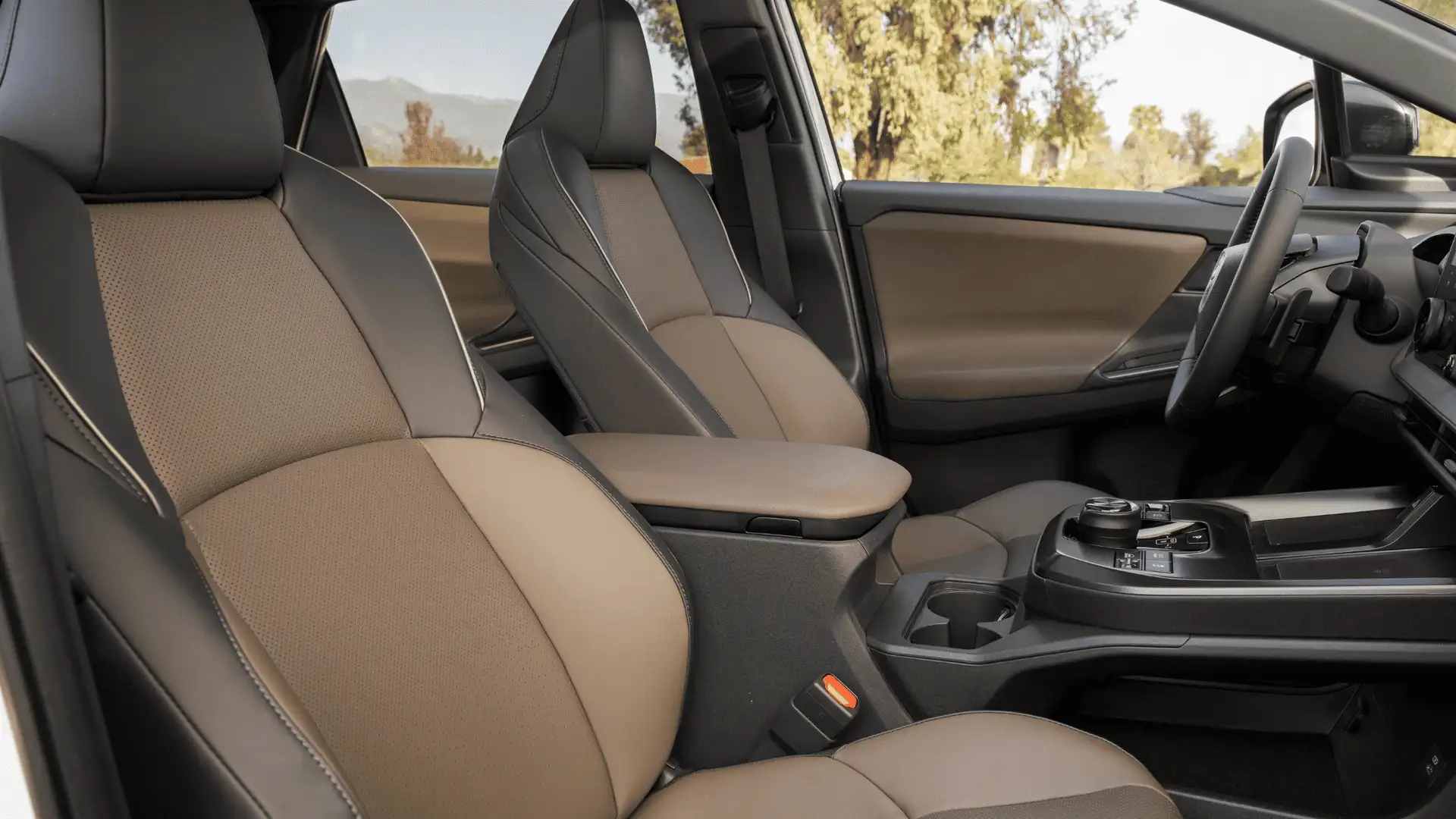 2026 Toyota bZ Woodland tan and black two-tone front seats and center console view