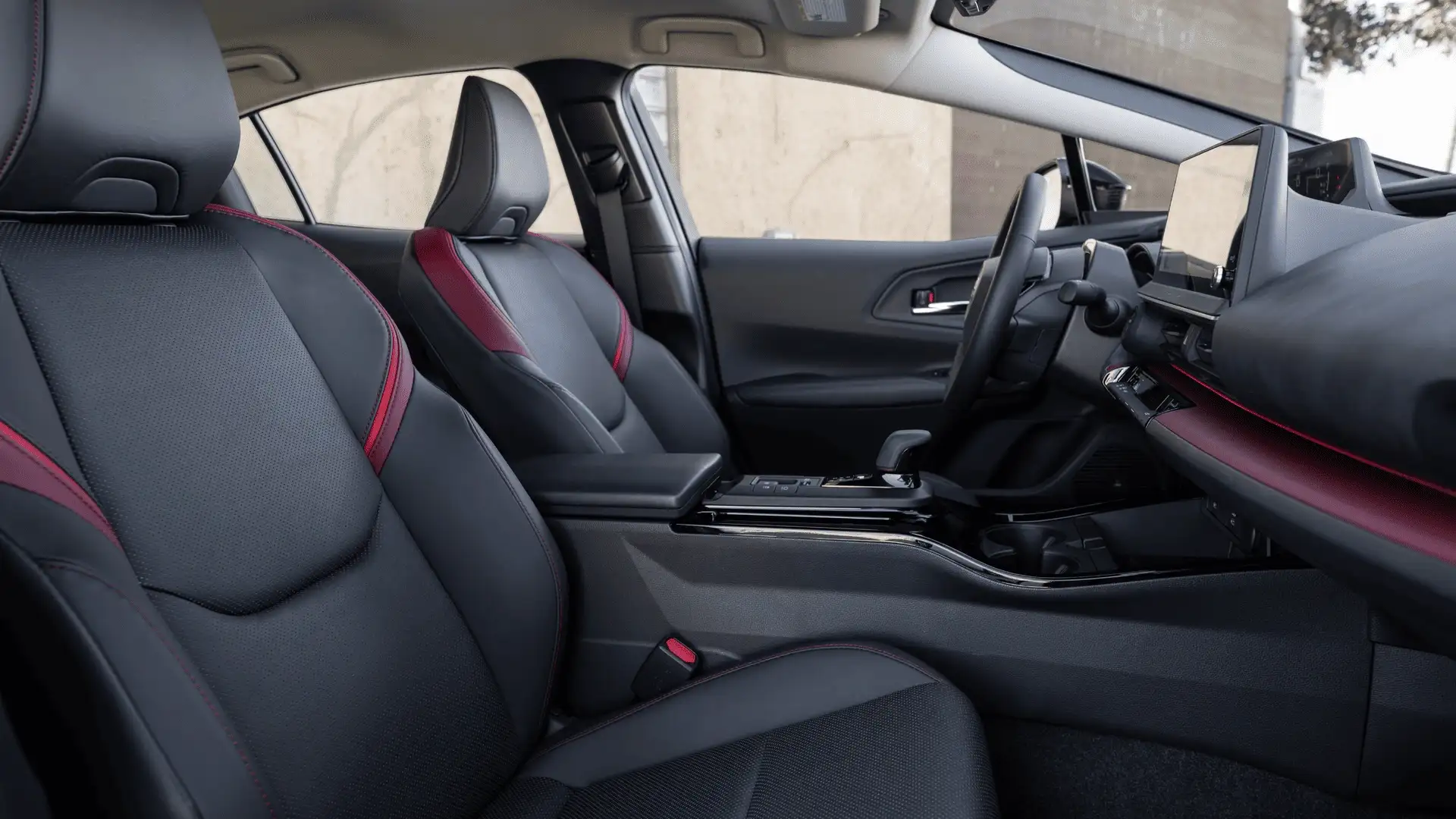 2026 Toyota Prius Plug-in Hybrid black interior with red accent stitching