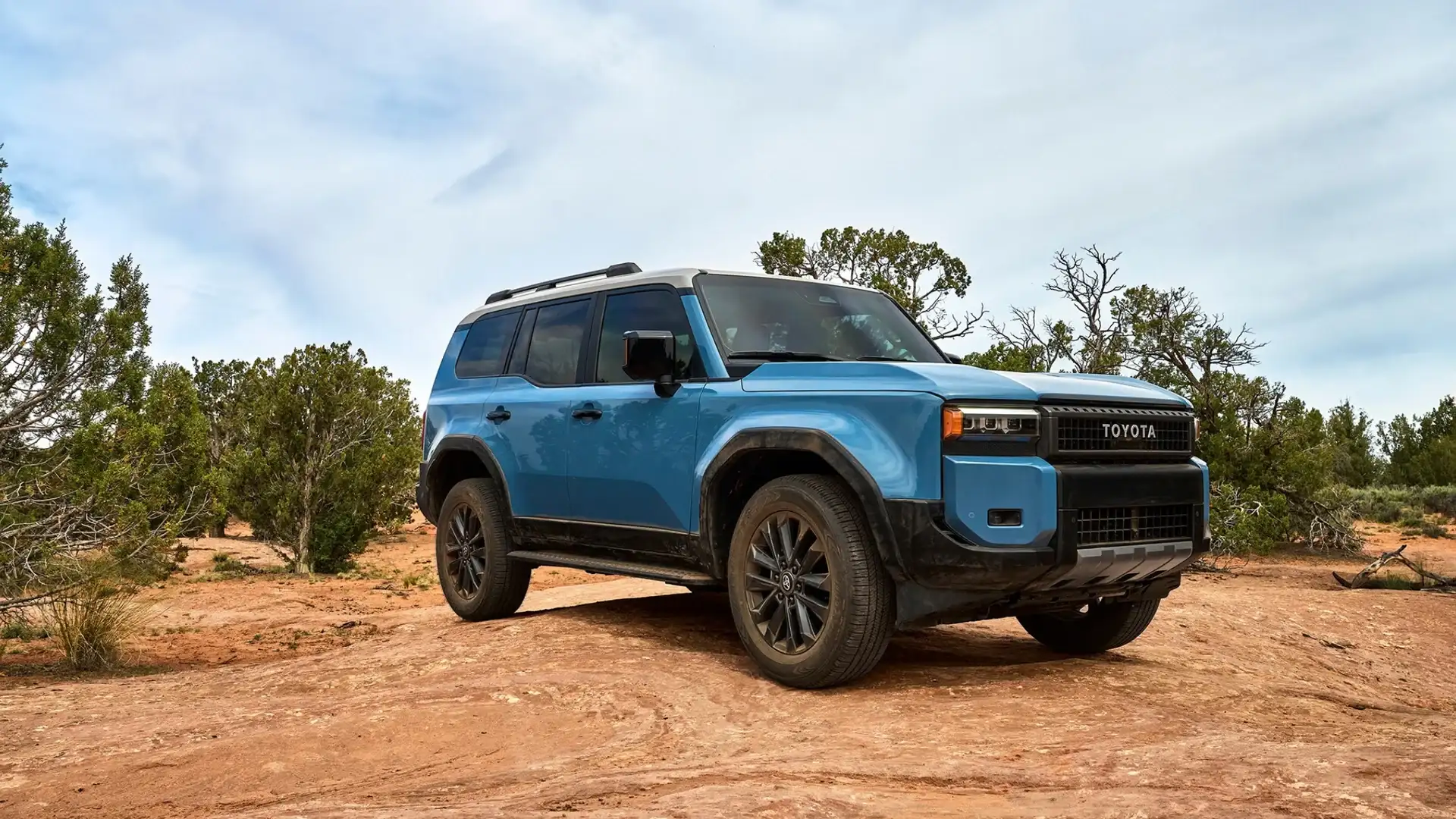 Blue 2027 Toyota Land Cruiser on red rock desert terrain in Hagerstown MD