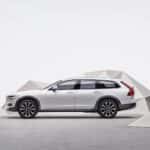 2025 Volvo V90 Cross Country silver side profile studio shot with geometric backdrop