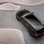 2025 Volvo V60 Cross Country wagon top-down rear view in black with panoramic roof design