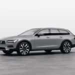 2025 Volvo V90 Cross Country wagon in gray shown in three-quarter front view with rugged stance