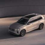 2025 Volvo XC90 luxury SUV exterior parked in modern architectural environment