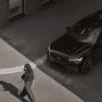 2025 Volvo XC60 Plug-in Hybrid SUV overhead front angle in black with sporty exterior styling